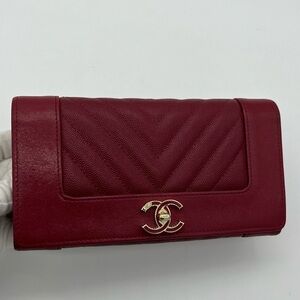 Authentic Chanel red chevron caviar flap long wallet